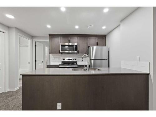 121 Corner Glen Way Ne, Calgary, AB - Indoor Photo Showing Kitchen With Stainless Steel Kitchen With Double Sink