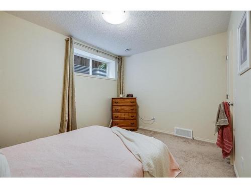 20 Brightondale Green Se, Calgary, AB - Indoor Photo Showing Bedroom