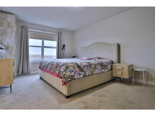 324 Evansborough Way Nw, Calgary, AB - Indoor Photo Showing Bedroom