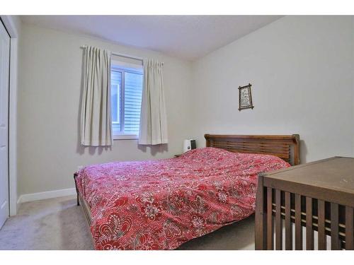 324 Evansborough Way Nw, Calgary, AB - Indoor Photo Showing Bedroom