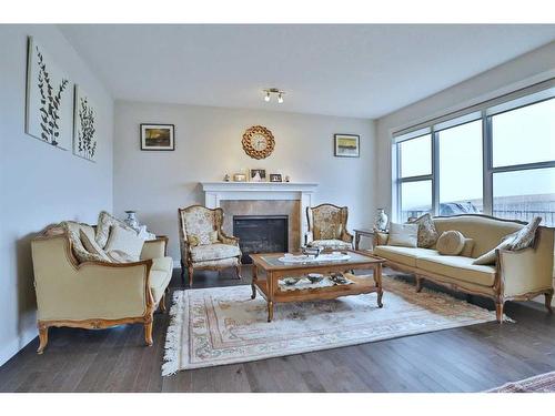 324 Evansborough Way Nw, Calgary, AB - Indoor Photo Showing Living Room With Fireplace