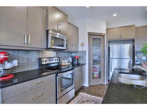 324 Evansborough Way Nw, Calgary, AB - Indoor Photo Showing Kitchen With Stainless Steel Kitchen With Double Sink With Upgraded Kitchen