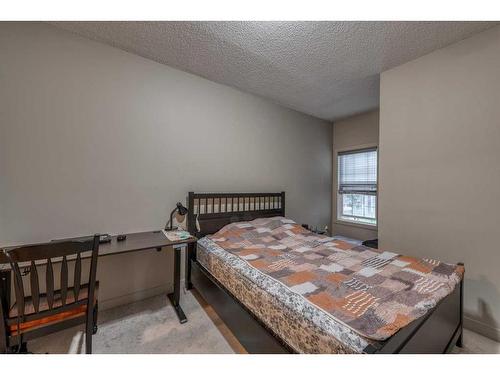 2609-11811 Lake Fraser Drive Se, Calgary, AB - Indoor Photo Showing Bedroom