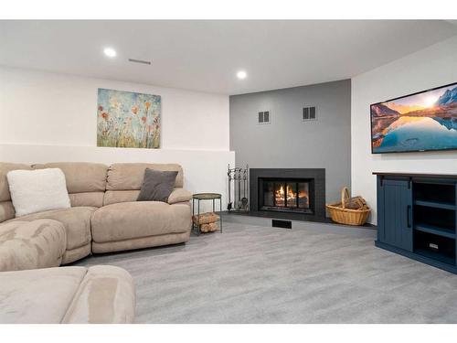 62 Wishart Street, Red Deer, AB - Indoor With Fireplace