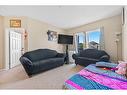 2212-1140 Taradale Drive Ne, Calgary, AB  - Indoor Photo Showing Living Room 