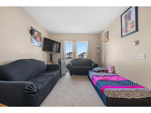 2212-1140 Taradale Drive Ne, Calgary, AB - Indoor Photo Showing Living Room