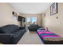 2212-1140 Taradale Drive Ne, Calgary, AB  - Indoor Photo Showing Living Room 