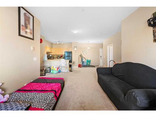 2212-1140 Taradale Drive Ne, Calgary, AB - Indoor Photo Showing Living Room