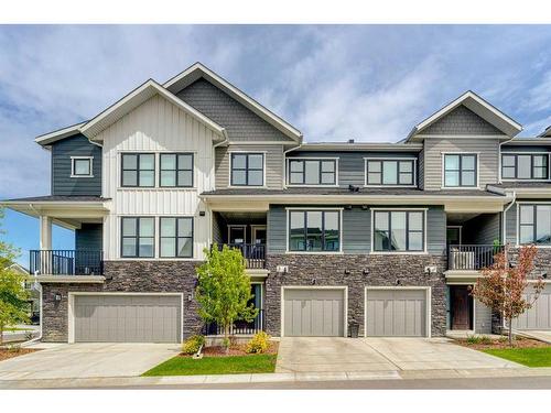 107 Crestridge Common Sw, Calgary, AB - Outdoor With Balcony With Facade