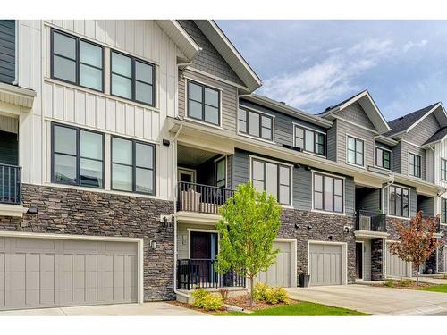 107 Crestridge Common Sw, Calgary, AB - Outdoor With Balcony With Facade