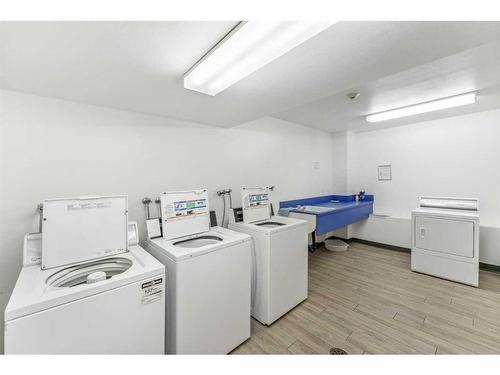 207-3730 50 Street Nw, Calgary, AB - Indoor Photo Showing Laundry Room