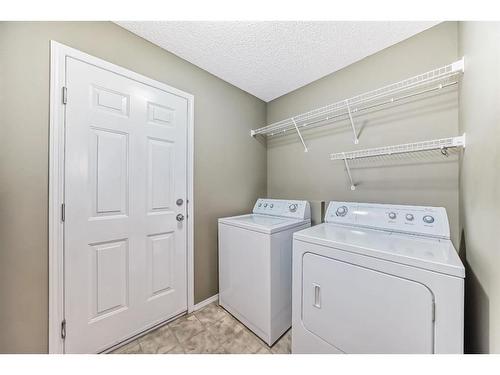 234 Panamount Hill Nw, Calgary, AB - Indoor Photo Showing Laundry Room