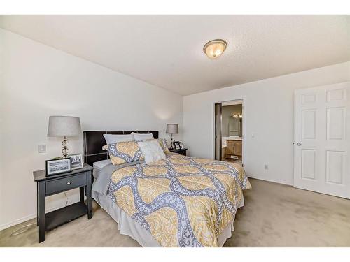 234 Panamount Hill Nw, Calgary, AB - Indoor Photo Showing Bedroom