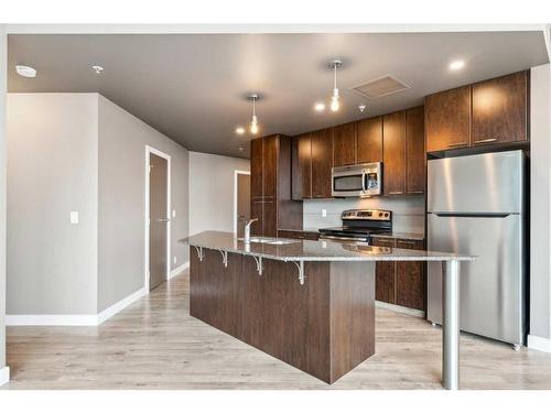 501-220 12 Avenue Se, Calgary, AB - Indoor Photo Showing Kitchen With Stainless Steel Kitchen With Upgraded Kitchen