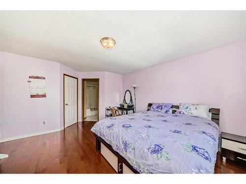 142 Harvest Creek Close Ne, Calgary, AB - Indoor Photo Showing Bedroom