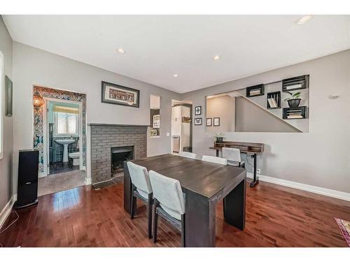 458 20 Avenue Nw, Calgary, AB - Indoor Photo Showing Dining Room With Fireplace