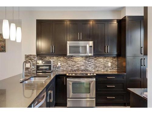 11 Nolan Hill Boulevard Nw, Calgary, AB - Indoor Photo Showing Kitchen With Stainless Steel Kitchen With Double Sink With Upgraded Kitchen