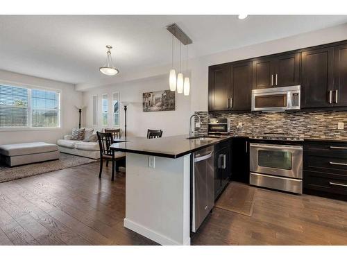 11 Nolan Hill Boulevard Nw, Calgary, AB - Indoor Photo Showing Kitchen With Stainless Steel Kitchen With Upgraded Kitchen