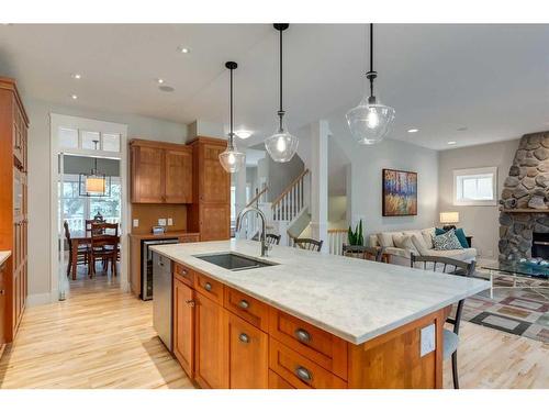 2022 7 Avenue Nw, Calgary, AB - Indoor Photo Showing Kitchen With Fireplace