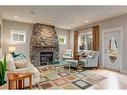 2022 7 Avenue Nw, Calgary, AB  - Indoor Photo Showing Living Room With Fireplace 