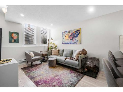 104-338 Seton Circle Se, Calgary, AB - Indoor Photo Showing Living Room