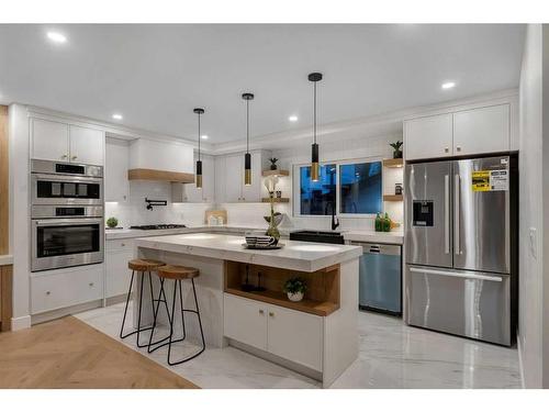 3723 Logan Crescent Sw, Calgary, AB - Indoor Photo Showing Kitchen With Stainless Steel Kitchen With Upgraded Kitchen