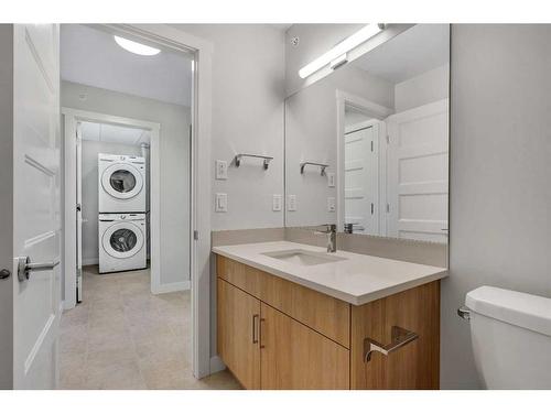 418-125 Wolf Hollow Crescent Se, Calgary, AB - Indoor Photo Showing Laundry Room