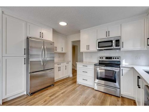 127 Midglen Place Se, Calgary, AB - Indoor Photo Showing Kitchen With Upgraded Kitchen