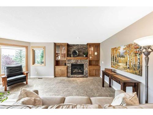 184 Scenic Hill Close Nw, Calgary, AB - Indoor Photo Showing Living Room With Fireplace