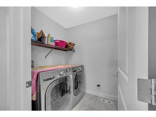 32 Ambelside Crescent Nw, Calgary, AB - Indoor Photo Showing Laundry Room