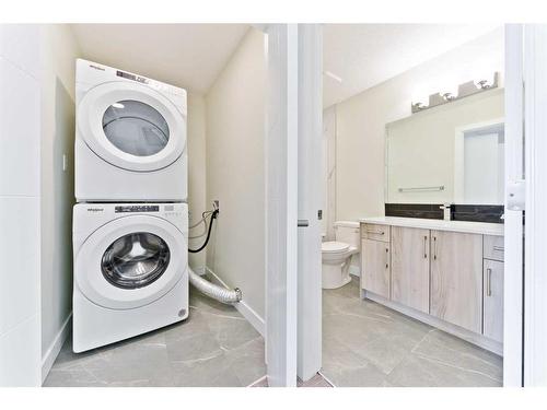 342 Midgrove Link Sw, Airdrie, AB - Indoor Photo Showing Laundry Room