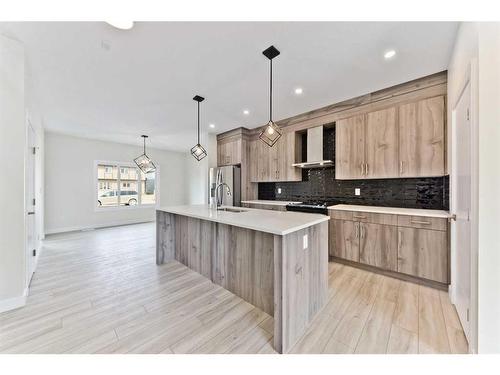 342 Midgrove Link Sw, Airdrie, AB - Indoor Photo Showing Kitchen With Upgraded Kitchen