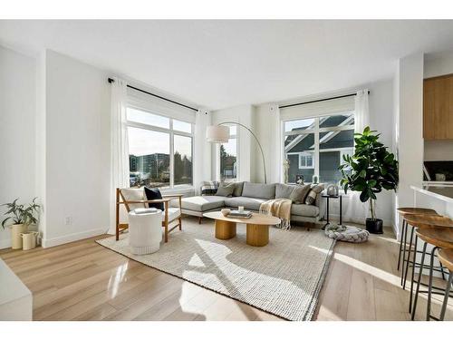 3957 Quesnay Wood Drive Sw, Calgary, AB - Indoor Photo Showing Living Room