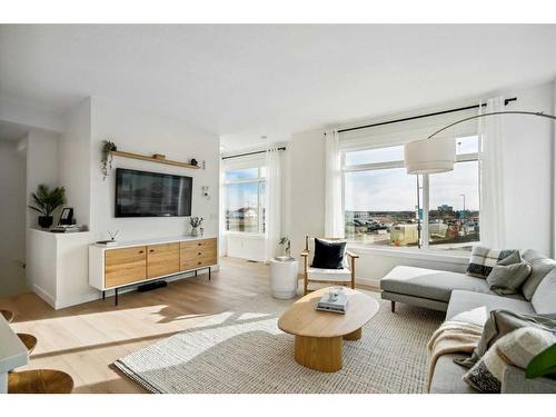 3957 Quesnay Wood Drive Sw, Calgary, AB - Indoor Photo Showing Living Room