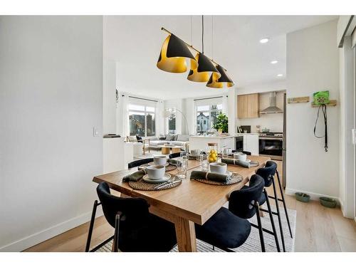 3957 Quesnay Wood Drive Sw, Calgary, AB - Indoor Photo Showing Dining Room