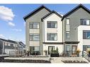 3957 Quesnay Wood Drive Sw, Calgary, AB  - Outdoor With Facade 