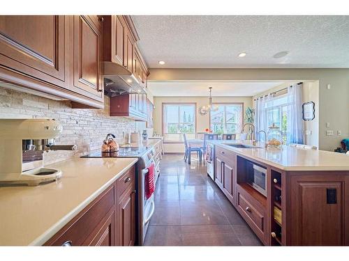 26 Quarry Point Se, Calgary, AB - Indoor Photo Showing Kitchen With Upgraded Kitchen