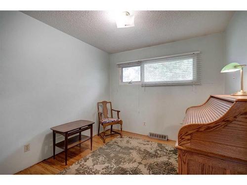 9440 Academy Drive Se, Calgary, AB - Indoor Photo Showing Bedroom