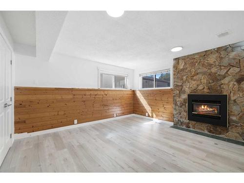 167 Castlebrook Drive Ne, Calgary, AB - Indoor Photo Showing Other Room With Fireplace