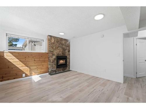 167 Castlebrook Drive Ne, Calgary, AB - Indoor Photo Showing Other Room With Fireplace