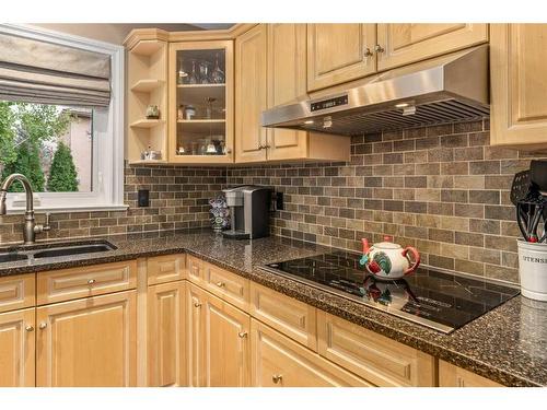 1733 Evergreen Drive Sw, Calgary, AB - Indoor Photo Showing Kitchen With Double Sink