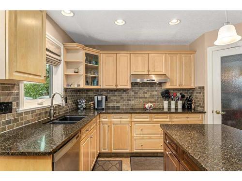 1733 Evergreen Drive Sw, Calgary, AB - Indoor Photo Showing Kitchen With Double Sink