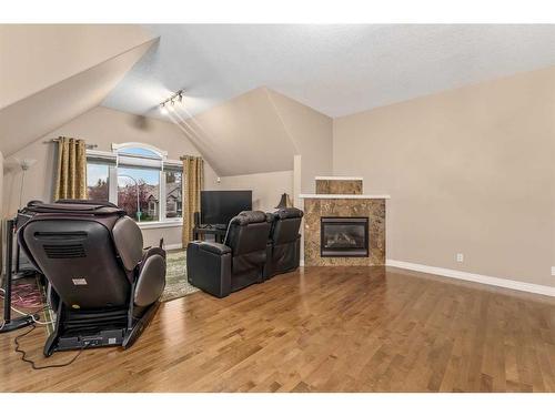 1733 Evergreen Drive Sw, Calgary, AB - Indoor With Fireplace