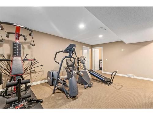 1733 Evergreen Drive Sw, Calgary, AB - Indoor Photo Showing Gym Room