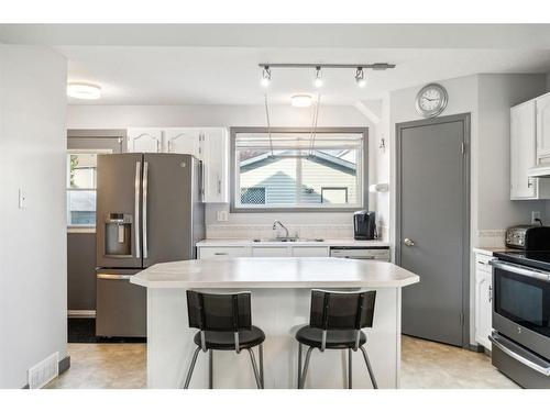 175 Country Hills Drive Nw, Calgary, AB - Indoor Photo Showing Kitchen With Stainless Steel Kitchen With Upgraded Kitchen