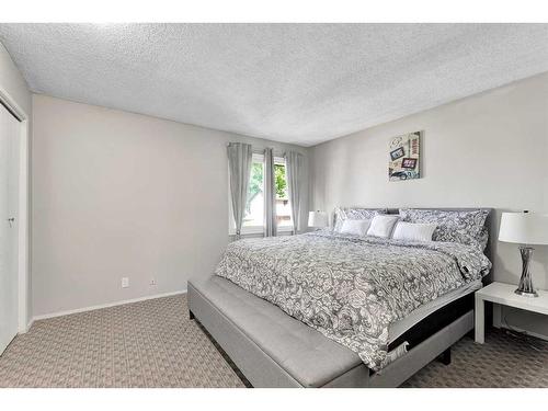 11 Falchurch Road Ne, Calgary, AB - Indoor Photo Showing Bedroom