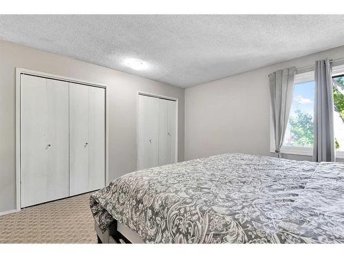 11 Falchurch Road Ne, Calgary, AB - Indoor Photo Showing Bedroom