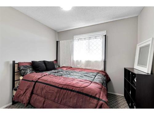 11 Falchurch Road Ne, Calgary, AB - Indoor Photo Showing Bedroom