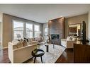 83 Mahogany Way Se, Calgary, AB  - Indoor Photo Showing Living Room With Fireplace 