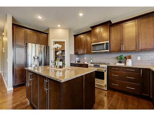 83 Mahogany Way Se, Calgary, AB - Indoor Photo Showing Kitchen With Upgraded Kitchen